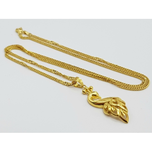 282 - An 18K Yellow Necklace with an 18K Gold Swan Pendant. 50cm and 35mm plus a child's 18k gold necklace... 