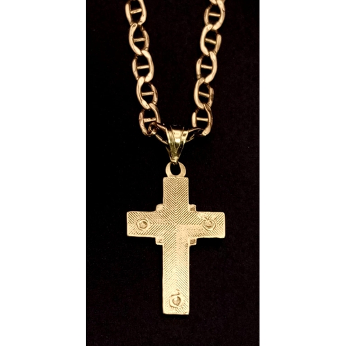 289 - A 14K Yellow Gold Chain with a 14K gold Crucifix Pendant. 
56cm and 25mm. 5.4g total weight. Ref: 6-... 