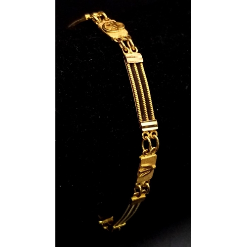 339 - A 22k Yellow Gold Intricate Black Enamel Bar Bracelet. 17cm. 10.9g total weight. Ref: 5-255.