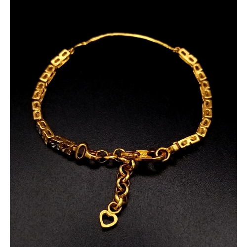 369 - A 22k Yellow Gold Baby Bracelet. Inscribed with the words - Love Baby. 12cm. 6.96g. Ref: 3-9381.