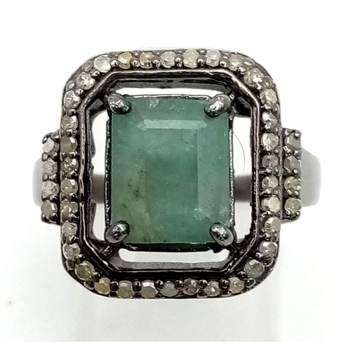 547 - A 3.20ct Natural Emerald Ring set in 925 silver, decorated with a 0.44ct Diamond surround and furthe... 