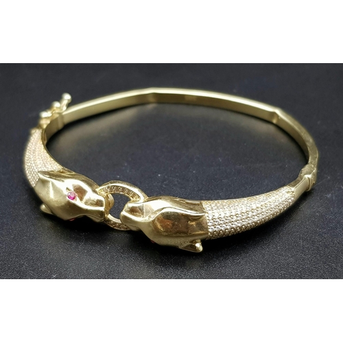 977 - A 14K Yellow Gold Jewellery Lot to Include: Three bangles A/F due to missing stones and kinks plus t... 