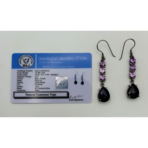 773 - A pair of Blue Sapphire Dangler Earrings with 0.17ct Diamond and 4ct Amethyst Gemstones, 
total weig... 