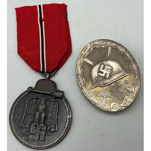 87 - WW2 German Eastern Front Medal and Silver Badge with Certificates Awarded to the Same Soldier. With
... 