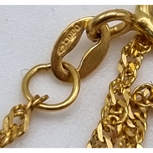 444 - A 22K yellow Gold Chain - 2g - Plus a 9K Yellow gold jewellery lot of: two stone set rings - size I ... 