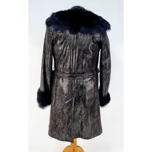 105 - A sophisticated and fashionable YVES SAINT LAURENT real fur lined, knee length, leather coat, crafte... 