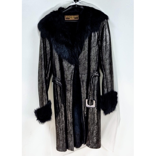 105 - A sophisticated and fashionable YVES SAINT LAURENT real fur lined, knee length, leather coat, crafte... 