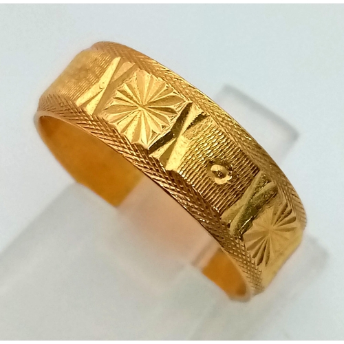 560 - Two 22k Yellow Gold Rings. A size M band ring and a size K white stone set ring. Total weight - 7.52... 