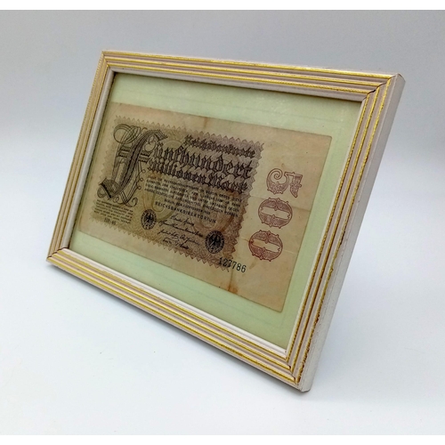 811 - A FRAMED 500 MILLIOM MARKS NOTE ISSUED BY THE REICHBANK IN 1923.