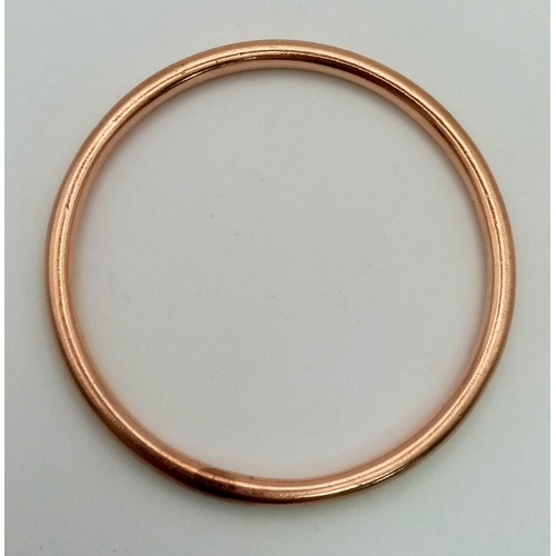 954 - A 9K Rose Gold Bangle. 6cm inner diameter. 9.08g. Ref: 3883