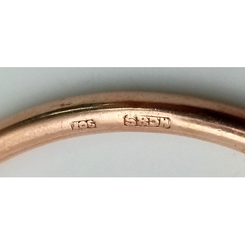 954 - A 9K Rose Gold Bangle. 6cm inner diameter. 9.08g. Ref: 3883