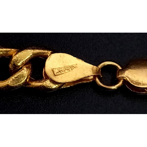 965 - A 22K Gold Identity Bracelet. If your name is Edna and you are from Mars it's your lucky day. 18cm. ... 