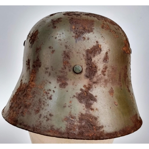 172 - WW1 Imperial German M16 Stahlhelm with Machine Gunners Insignia and Battle Damage.