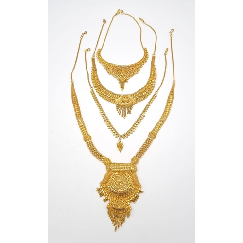 314 - A Mixed Gold Lot to Include: A 21k Yellow Gold Thali Set - A/F - 89.1g. 2 x 21k yellow gold necklace... 