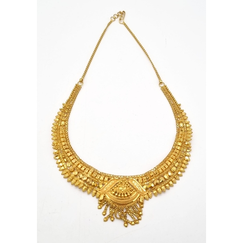 314 - A Mixed Gold Lot to Include: A 21k Yellow Gold Thali Set - A/F - 89.1g. 2 x 21k yellow gold necklace... 