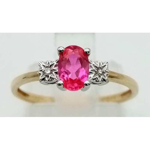 468 - A 9k gold ruby and diamond trilogy ring. Size L. 1.25g total weight.