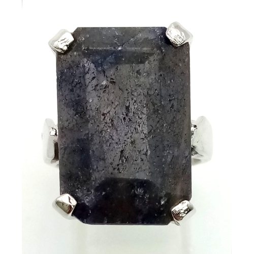 499 - 27Cts Blue Sapphire Ring. Rectangular step cut. 925 Sterling silver. size W- 13.50g weight