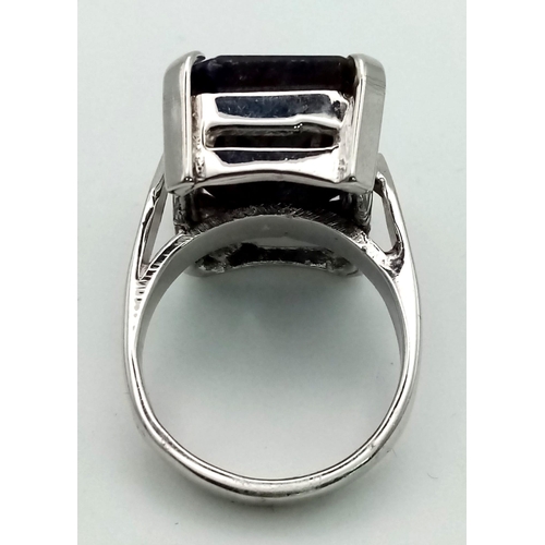 499 - 27Cts Blue Sapphire Ring. Rectangular step cut. 925 Sterling silver. size W- 13.50g weight