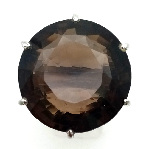 534 - 55 Cts Smoky Quartz Ring. Round cut. 925 Sterling silver in presentation box. Size P. Weight 28.20g