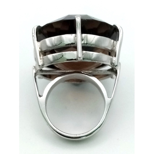 534 - 55 Cts Smoky Quartz Ring. Round cut. 925 Sterling silver in presentation box. Size P. Weight 28.20g