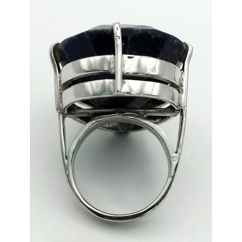 561 - 53 Cts Blue Sapphire Ring. Pear cut. 925 Sterling silver. Weight 26.60g Size O. Comes in presentatio... 