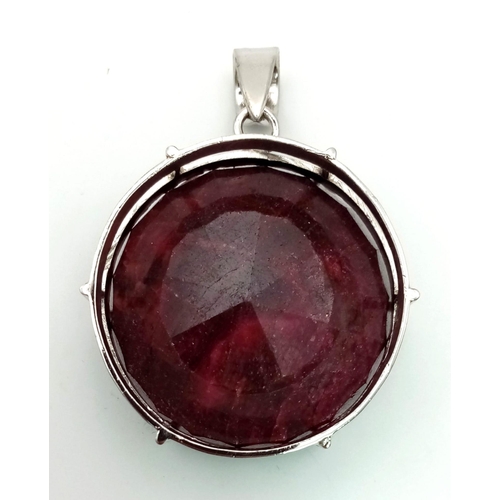 568 - 390 Cts Massive Ruby Pendant. 925 Sterling silver. Weight 80g. Comes in presentation box.