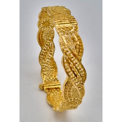 110 - A Mixed Gold Lot to Include: A 22K yellow gold selection of 10 bangles - 103.7g total weight - A/F. ... 