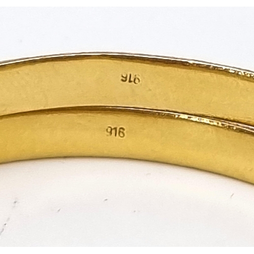 110 - A Mixed Gold Lot to Include: A 22K yellow gold selection of 10 bangles - 103.7g total weight - A/F. ... 