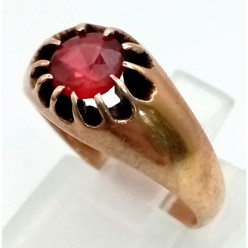 487 - An Edwardian 9k rose gold gypsy ring set with red stone. Size M. Weight 4.3g