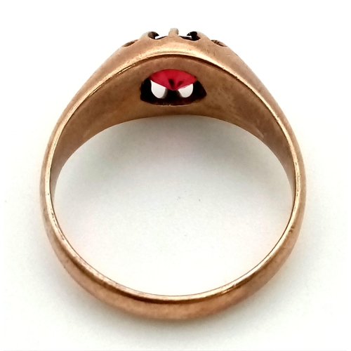 487 - An Edwardian 9k rose gold gypsy ring set with red stone. Size M. Weight 4.3g