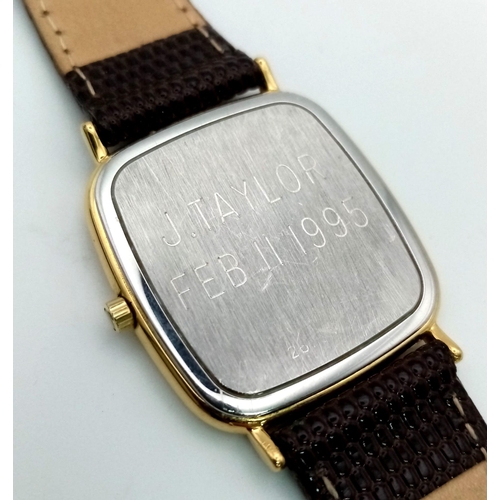 489 - A Vintage Longines Gents Watch. Brown leather strap. Case - 30 x 30mm. White dial with date window. ... 