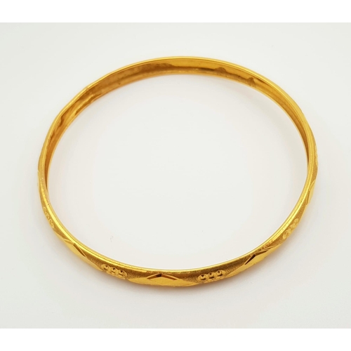 631 - A 22K Yellow Gold Bangle. 65mm inner diameter. 9.58g. Ref: 3876.