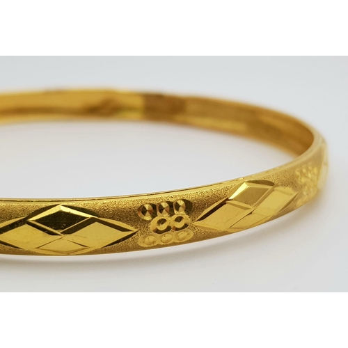 631 - A 22K Yellow Gold Bangle. 65mm inner diameter. 9.58g. Ref: 3876.