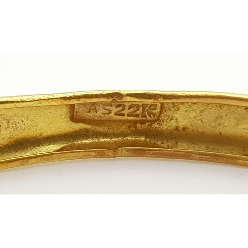 631 - A 22K Yellow Gold Bangle. 65mm inner diameter. 9.58g. Ref: 3876.