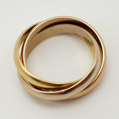 672 - An 18K Three Colour Gold Russian Wedding Ring. Size L. 8.67g. Ref: 4003