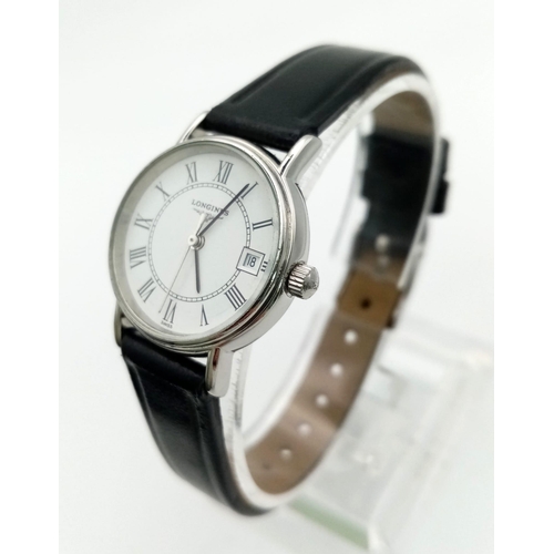 711 - A Longines Ladies Quartz Watch. Black leather strap. Case - 22mm. Quartz movement. White dial with d... 