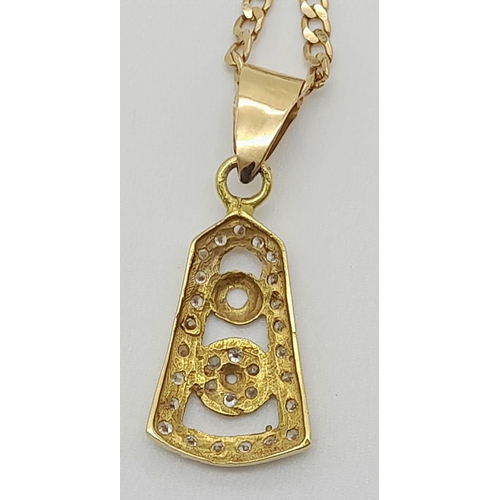 779 - An 18K Yellow Gold Link Necklace with an 18K Gold and White Stone Pendant. 50cm and 3cm. 6.65g total... 