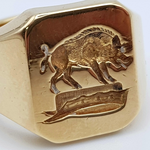 849 - An 18K Yellow Gold Wild Boar Signet Ring. Size O 1/2. 26.46g. Ref: 3834.