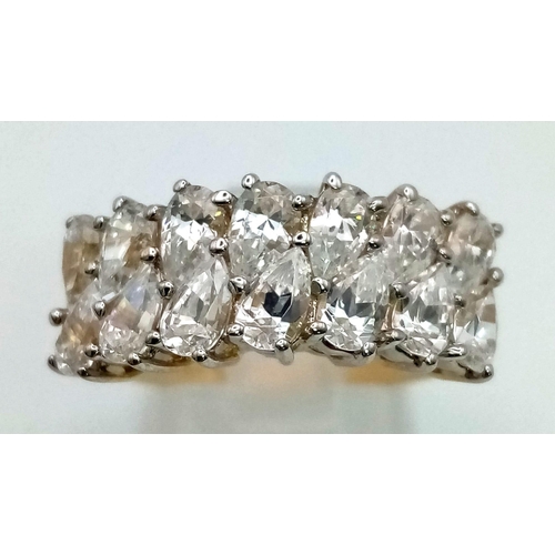 935 - A 14k gold ring set with diamond quality cubic zirconia. Size T. 5.7g total weight.