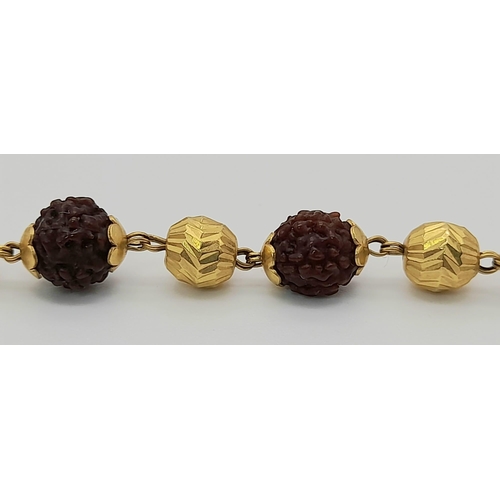 953 - An 18K Yellow Gold and Rudraksha Necklace. 56cm. 28.2g total weight. A/F. Ref: 1-9456