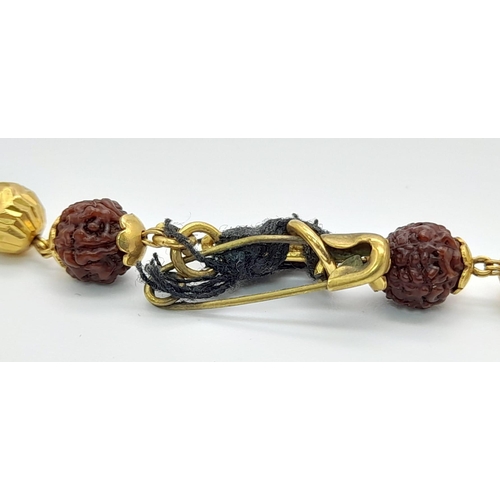 953 - An 18K Yellow Gold and Rudraksha Necklace. 56cm. 28.2g total weight. A/F. Ref: 1-9456