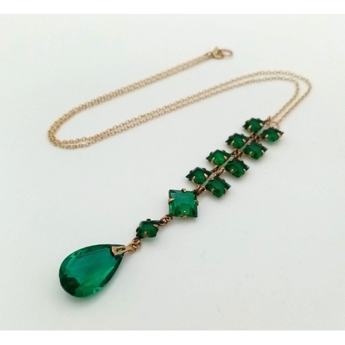 886 - An Art Deco Era Green Stone Ensemble on a 9K Yellow Gold Disappearing Necklace. 44cm. 4.75g total we... 