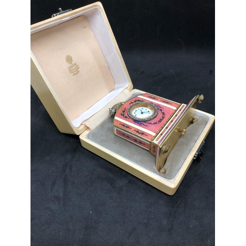 706 - A stunning Russian silver and enamel diamond clock 

Weight 233.3 grams 
Height to hog top 9cm
Lengt... 