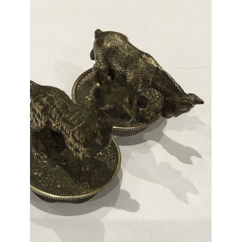 363 - A European antique white metal pair of novelty animal bottle stoppers.

Height of donkey 2.8cm
Lengt... 