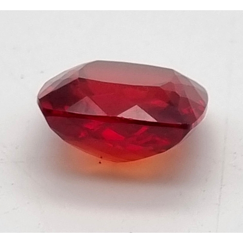 459 - A 35ct Well Faceted Blood-Orange Coloured Cushion-Cut Gemstone. 19 x 19mm. No certificate so as foun... 