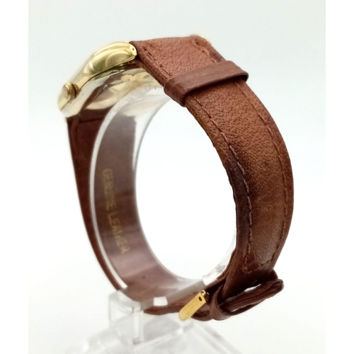 690 - A Vintage Raymond Weil Automatic Gents Watch. Brown leather strap. Square case - 30 x 30mm. Gilded d... 