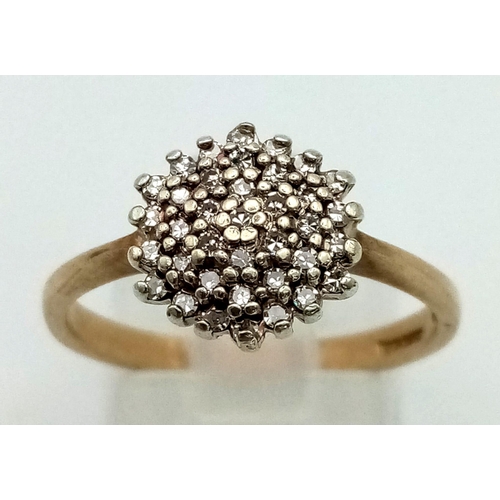 780 - A 9K Yellow Gold Diamond Cluster Ring. 0.20ct. Ring Size O. Total Weight 2.9 grams