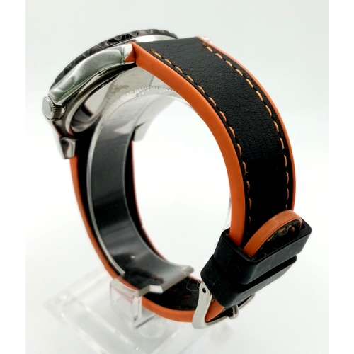 951 - A Timex Chronograph Gents Watch. Black and orange leather strap. Case -45mm. Black dial with three s... 