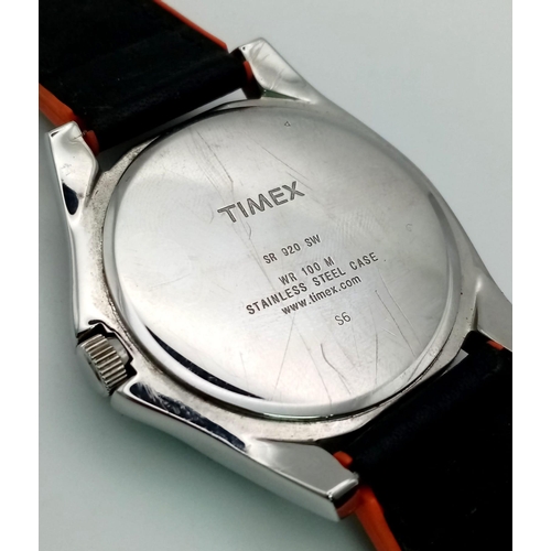 951 - A Timex Chronograph Gents Watch. Black and orange leather strap. Case -45mm. Black dial with three s... 