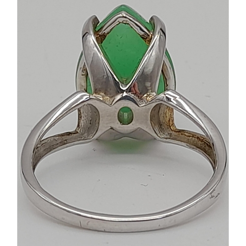 914 - SILVER and AVENTURINE RING , having attractive silver shoulder design with pear shaped  JADE AVENTUR... 